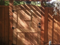 Custom gate with peep window and arbor