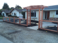Hogwire mesh fence with arbor