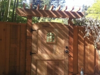 Custom gate with peep window and arbor